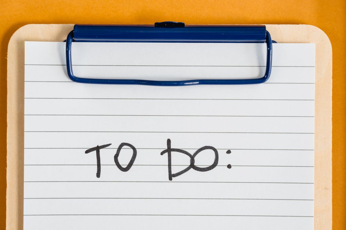 A to-do list on a clipboard ready for a final review